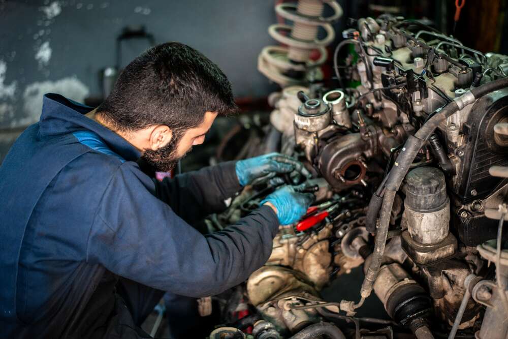 a person working on a machine
